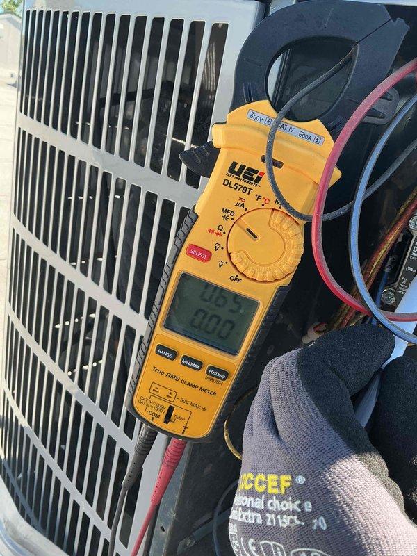 Performed comprehensive tune-up and clean-and-check service on single-system air conditioning unit with air handler. Inspected electrical components including capacitor, contactor, and wiring connections; verified all connections secure and functioning properly. Replaced air filter and measured system amperage at 45 amps with temperature reading of 90.2°F at outdoor condensing unit. All components operating within normal parameters; system tested and left in proper working condition.