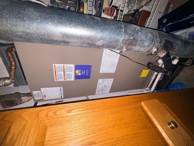 Completed air conditioning and air handler clean and check service on residential HVAC system located in attic space. Performed comprehensive tune-up maintenance including inspection of all major components, cleaning of coils, verification of refrigerant levels, and testing of electrical connections. Replaced 16x20x1 air filter and confirmed Honeywell Pro Series thermostat operating properly at 74°F cooling setpoint. All system components found in satisfactory working condition with no deficiencies noted.