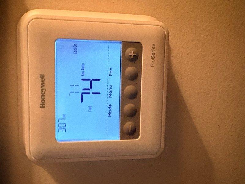 Completed air conditioning and air handler clean and check service on residential HVAC system located in attic space. Performed comprehensive tune-up maintenance including inspection of all major components, cleaning of coils, verification of refrigerant levels, and testing of electrical connections. Replaced 16x20x1 air filter and confirmed Honeywell Pro Series thermostat operating properly at 74°F cooling setpoint. All system components found in satisfactory working condition with no deficiencies noted.
