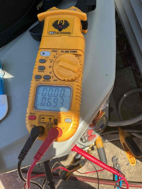 Completed comprehensive clean and check maintenance service on air conditioning system per comfort plan agreement. Performed standard diagnostic testing including electrical measurements with digital clamp meter, verified proper system operation, and documented equipment conditions. All components inspected and found operating within normal parameters.