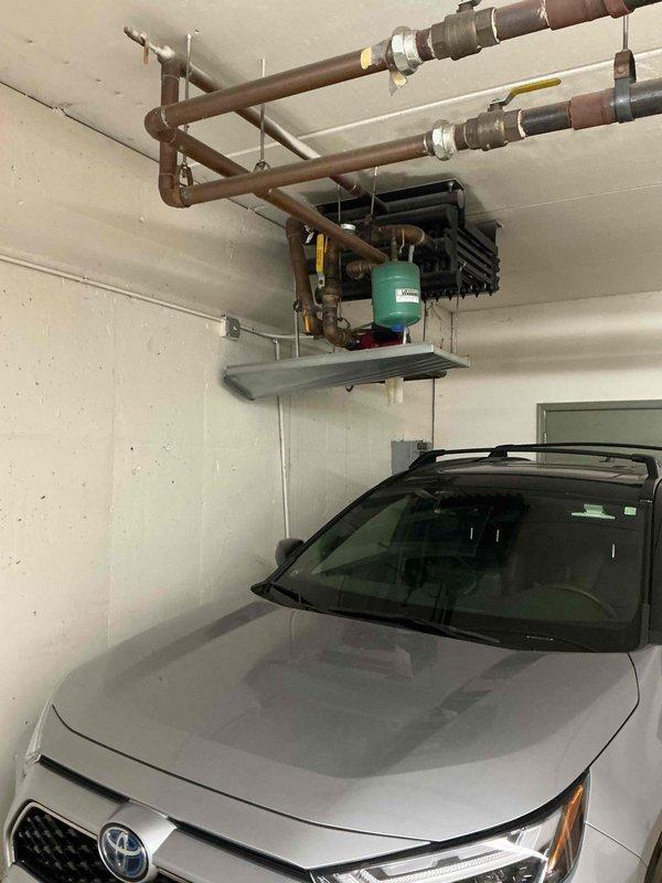 Completed comprehensive spring maintenance on multi-system HVAC comfort plan including seven Burnham hydronic heating boilers, six circulating pumps, two water heaters, and four unit heaters. Performed seasonal shutdown procedures on all hydronic heating equipment, lubricated bearings and motors throughout. Serviced rooftop unit and association room AC/AH systems by cleaning and inspecting condenser coils, verifying refrigerant charge, checking compressor operation, lubricating all bearings and motors, inspecting control and contact points, and measuring amperage draw under load conditions. Replaced ten 1-inch carbon filters per seasonal maintenance schedule. All systems inspected and prepared for seasonal transition with equipment operating within manufacturer specifications.