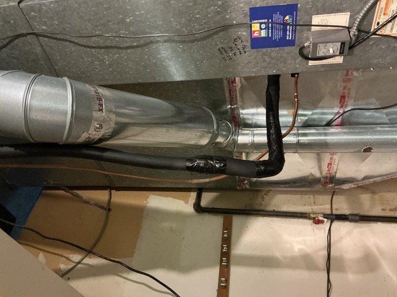 Replaced 5-ton air conditioning unit and evaporator coil serving rear zone of commercial facility. Removed existing equipment, installed new condensing unit with matching A-coil, completed refrigerant line connections using copper piping, and verified proper ductwork integration with existing HVAC infrastructure. System tested and operational upon completion.