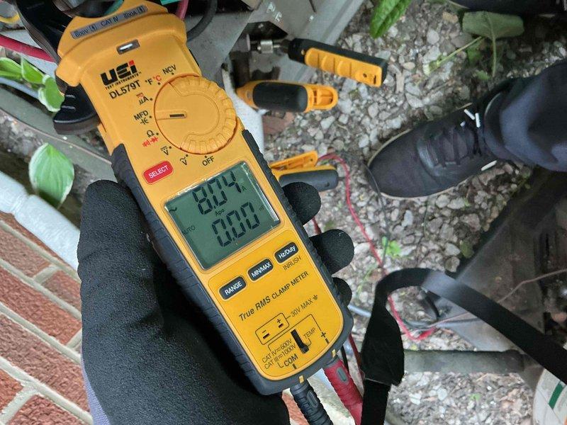 Completed annual Comfort Plan maintenance on residential air conditioning system. Performed comprehensive clean and check including inspection of outdoor condensing unit with electrical components, contactor assembly, and wiring connections. Verified amperage draw readings using digital clamp meter, recording 80.4 amps during operational testing to ensure system is operating within manufacturer specifications and providing optimal cooling performance for the upcoming season.