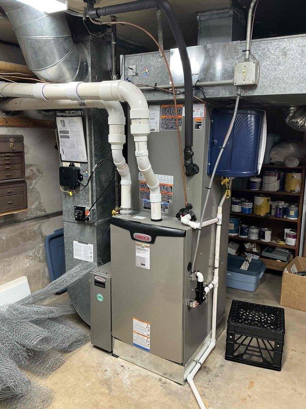 Completed annual air conditioning clean and check maintenance per Comfort Plan agreement on Lennox system. Performed comprehensive inspection of outdoor condenser unit and indoor furnace/air handler, verified proper operation of all components, checked refrigerant levels, cleaned condenser coils, inspected electrical connections, and tested system performance to ensure optimal cooling efficiency for the upcoming season.