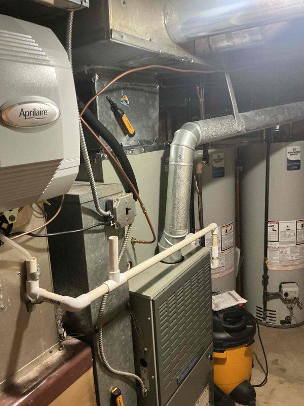 Completed comprehensive clean and check maintenance service on two HVAC systems as part of Comfort Plan agreement. Performed full inspection and maintenance on Lennox outdoor condenser unit and indoor air handler system with humidification equipment. All systems tested and operating within normal parameters, with Comfort Plan renewal processed for continued coverage.