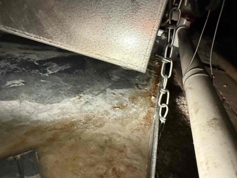 Responded to no-cooling call on one-year-old AC system originally installed by our company. Performed diagnostic inspection in attic space, examining condensate drain system and evaporator coil assembly. Found evidence of moisture accumulation and oxidation on ductwork components, indicating potential drainage issues. Conducted thorough system assessment using diagnostic equipment to identify root cause of unit failure. Documented equipment condition with photos showing insulated ductwork, condensate chain assembly, and mechanical components. Completed warranty service inspection and collected continuation of labor time from previous CNC work performed earlier in the month.