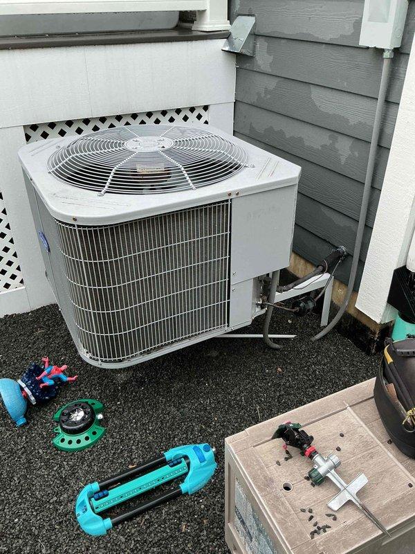 Responded to no cooling complaint on residential split system. Upon arrival, performed diagnostic evaluation of indoor air handler and outdoor condensing unit. Utilized refrigerant manifold gauges to check system pressures and assess refrigerant charge levels. Inspected copper refrigerant line connections, PVC condensate drainage system, and electrical components at both indoor and outdoor units. Measured and verified proper installation clearances and venting configuration on furnace/air handler. Conducted thorough system evaluation to identify root cause of cooling failure. Communicated findings and presented repair options to restore system functionality.
