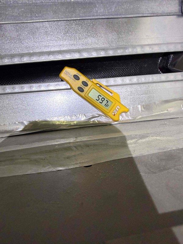 Responded to callback for air conditioning unit not cooling after recent service. Inspected electrical control panel and measured supply air temperature at 58°F, confirming inadequate cooling performance. Diagnosed and addressed issue related to previous service visit to restore proper cooling operation.
