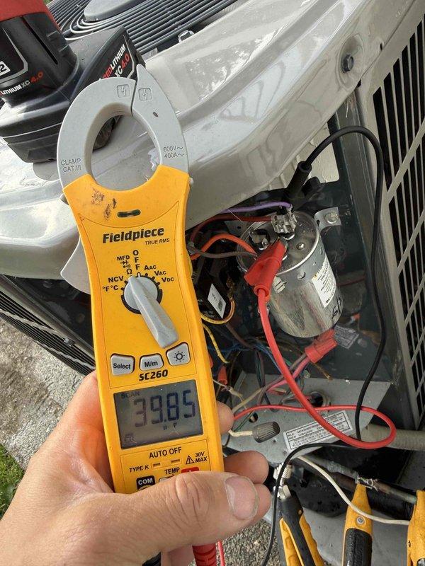 Performed comprehensive clean and check on outdoor air conditioning system per comfort plan agreement. Conducted electrical diagnostics using clamp meter, recording amperage readings and verifying capacitor operation. Inspected condenser unit components, cleaned exterior surfaces, and confirmed proper system operation with all parameters within manufacturer specifications.