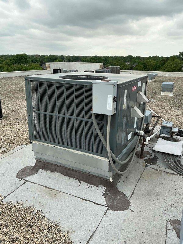 # Replace Capacitor and Contactor for West RTU

Responded to service call for non-operational rooftop package unit on commercial facility. Upon arrival, accessed the west RTU and performed diagnostic evaluation of electrical components. Testing revealed failed capacitor and contactor preventing compressor operation.

Opened electrical control panel and disconnected power at the rooftop disconnect switch. Removed defective dual-run capacitor and single-pole contactor from control circuit. Verified proper voltage supply and checked all wire connections for integrity. Installed new OEM-equivalent capacitor with correct microfarad rating for compressor and condenser fan motor. Replaced contactor with appropriate amperage-rated component to handle compressor load.

Reconnected all electrical terminations following proper color coding and secured wiring within panel enclosure. Restored power and cycled unit through complete operational sequence. Verified compressor startup, confirmed proper 