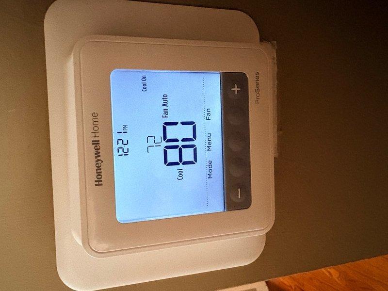 Responded to callback for cooling system not reaching setpoint one week after scheduled maintenance. Upon arrival, verified thermostat displaying 78°F while set to lower temperature. Inspected air handler and capacitor connections, confirmed all electrical components properly secured and functioning. System cycling normally with no apparent mechanical or electrical faults identified during diagnostic evaluation.