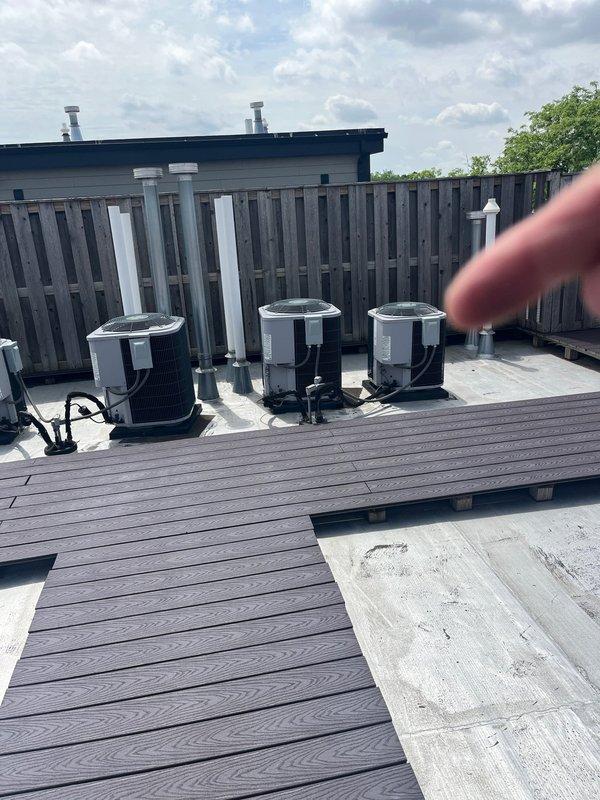 Provided comprehensive estimate for complete HVAC system replacement including furnace and air conditioning unit following previous diagnosis of cracked heat exchanger and ongoing safety concerns. Evaluated existing Heil air handler installation, rooftop condenser units, refrigerant lines, and associated plumbing connections. Presented replacement options to address critical heat exchanger failure, green diagnostic light indication on furnace, and potential water heater leak to ensure system safety and proper operation.