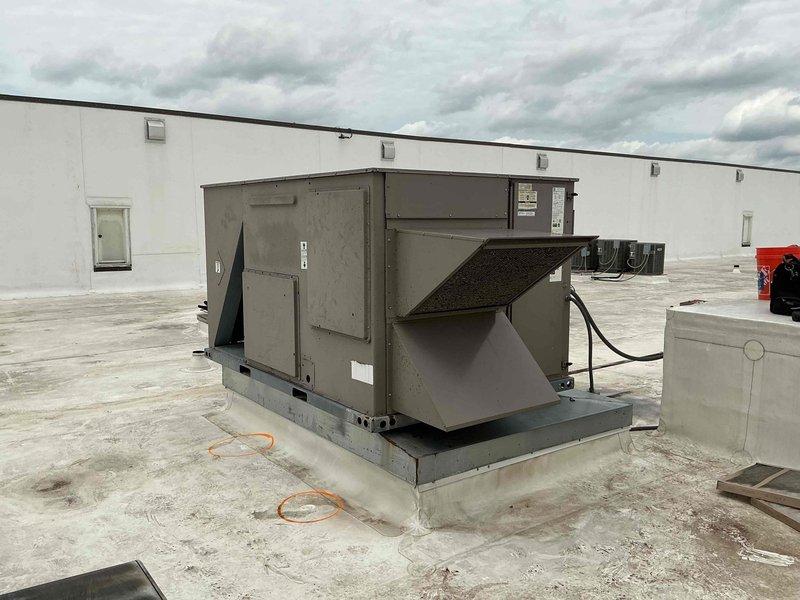 Completed spring preventive maintenance per commercial maintenance agreement on rooftop unit, four boilers, two domestic water heaters, two garage exhaust fans, four small exhaust fans, three CO systems, three circulating pumps, and four snow melt systems. Performed electrical diagnostics on RTU control board, recording voltage readings at 20.9V to verify proper operation. Inspected rooftop unit exterior condition and confirmed proper mounting and access panel security. Investigated reported noise complaint from unit 311 regarding excessive bathroom vent noise during high winds and storms; conducted rooftop assessment to identify potential source and provided diagnosis to property management for resolution.