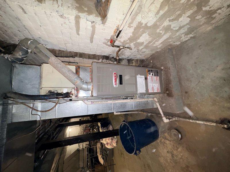 Responded to no cooling complaint where system was not maintaining set temperature. Located HVAC unit in basement utility area. Performed diagnostic testing using clamp meter to verify electrical readings and system operation. Identified and resolved issue preventing proper cooling function. System restored to normal operation with appropriate temperature control functionality.