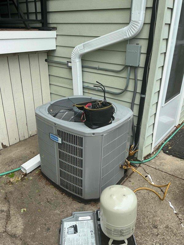 Responded to no cooling call on residential air conditioning system. Upon arrival, inspected American Standard furnace with air handler in basement and outdoor condensing unit. Verified thermostat settings, checked electrical breakers, and confirmed system power supply. Diagnosed non-operational outdoor unit, identifying failed capacitor and contactor issues preventing compressor from starting. Replaced defective dual run capacitor and contactor, restored proper electrical connections at outdoor disconnect. Tested system operation, confirmed proper amperage draw on compressor and fan motor, and verified adequate airflow at supply registers. System restored to full cooling operation with all components functioning within manufacturer specifications.