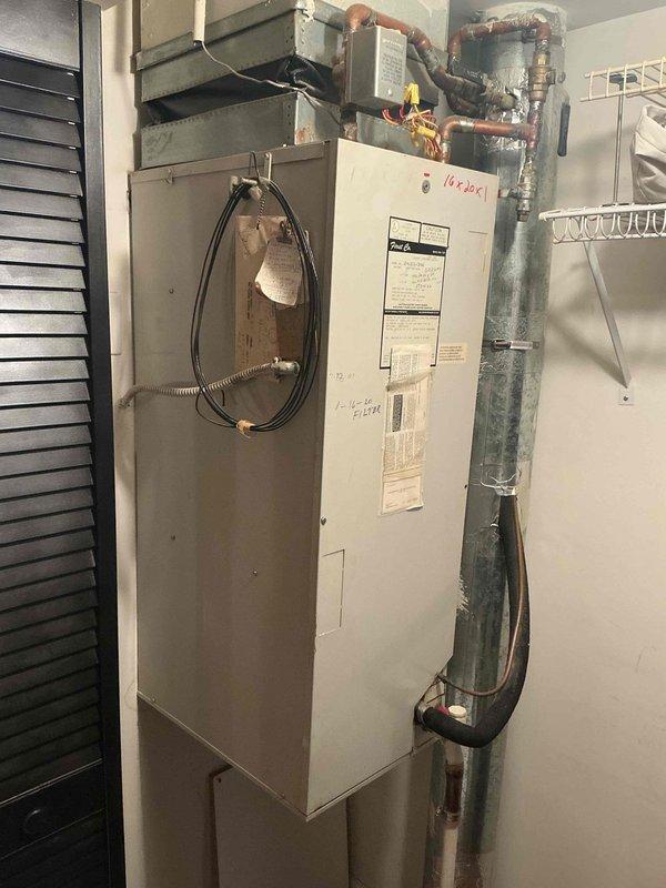 Completed full HVAC system replacement in condo unit, removing and disposing of existing air handler with hydronic coil and rooftop condensing unit per EPA guidelines. Installed new ADP 1.5-2.0 ton air handler with hydronic coil in mechanical closet, fabricating necessary sheet metal transitions to connect to existing supply and return ductwork and electrical service. Installed new Lennox 13 SEER2 ML13KC1-018-230 2.0 ton condensing unit on roof in same location as previous unit. Flushed existing copper lineset and connected new equipment, evacuated system to remove moisture and air, then charged with R454b refrigerant to manufacturer specifications. Installed new Honeywell T4 thermostat to replace existing unit. Performed complete system startup, testing, and final adjustments to ensure proper operation of all components.