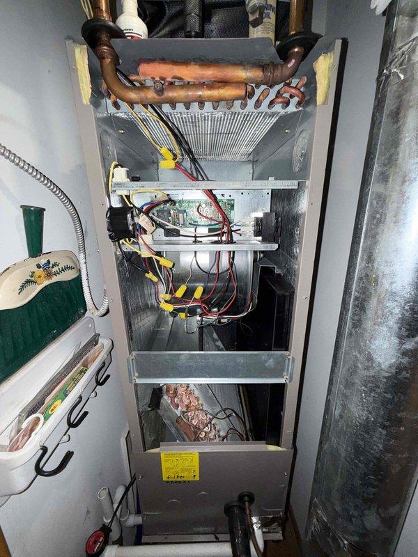Completed preventative maintenance tune-up on residential split HVAC system. System was found operating without an air filter; installed replacement filter to ensure proper airflow and equipment protection. Performed standard maintenance procedures including inspection of heat exchanger, refrigerant lines, electrical connections, and control board wiring. Verified electrical performance using clamp meter, confirming system operating within normal parameters at 39.8 volts. All components found in satisfactory condition with no additional repairs required at this time.