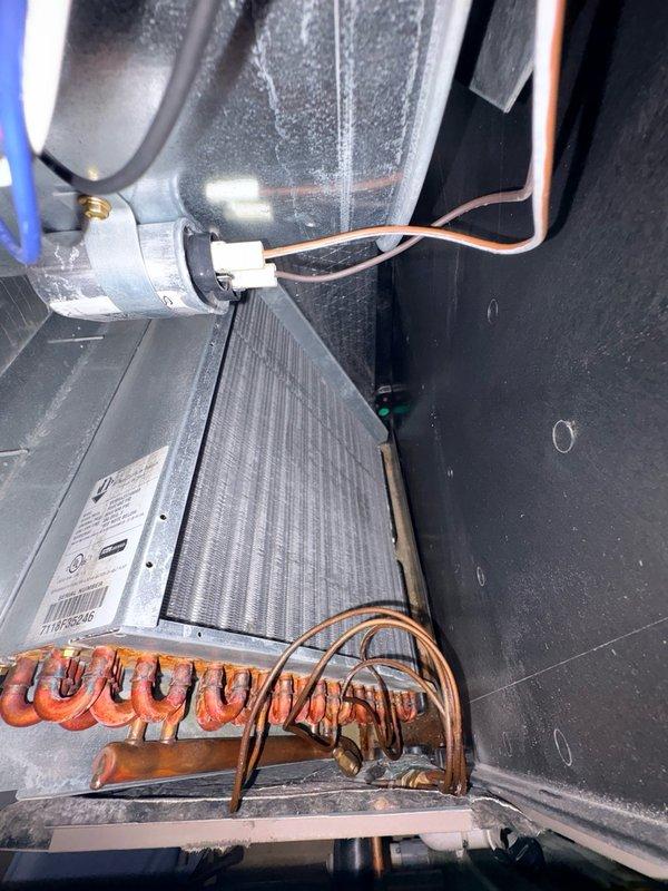 Completed comprehensive clean and check maintenance service on single HVAC system per comfort plan agreement. Performed thorough inspection of outdoor condensing unit including fan motor operation, compressor function, and refrigerant line connections. Inspected evaporator coil assembly which displayed moderate oxidation and surface corrosion on copper tubing, though coil remains functional with adequate airflow through fins. Verified capacitor condition, electrical connections, and wiring integrity throughout system. All components operating within normal parameters at time of service completion.