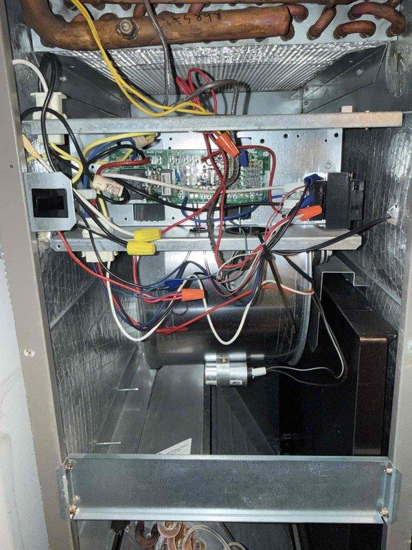 Performed comprehensive tune-up and inspection on single-system air conditioning unit with air handler. Inspected all electrical connections, control board, and wiring harnesses within air handler compartment. Verified proper operation of capacitor and all electrical components. Examined refrigerant lines and insulation for integrity. Replaced air filter. Cleaned and inspected internal components, removing dust accumulation from control board area and electrical compartment. Verified all safety labels and warning stickers present and legible. Tested system operation and confirmed proper functionality of all components. Unit operating within normal parameters upon completion of maintenance service.