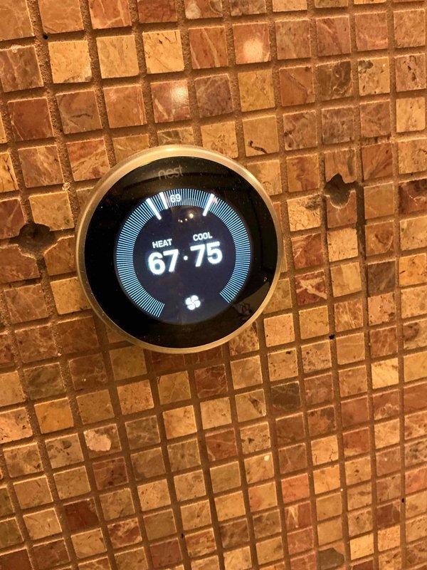 Completed spring clean and check maintenance service on two air conditioning systems per comfort plan agreement. Performed comprehensive system diagnostics using digital multimeter to verify electrical components, tested voltage and amperage readings at outdoor unit, inspected control boards and wiring connections, cleaned condenser coils, and verified proper thermostat operation with heat and cool setpoints configured at 67°F and 75°F respectively.