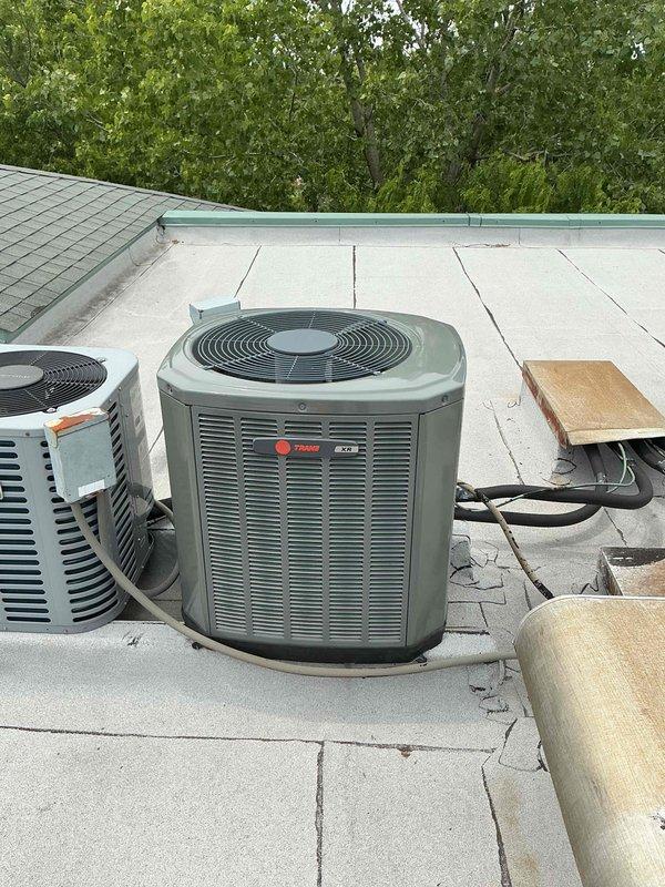 Completed preventive maintenance tune-up on rooftop Trane air conditioning system and air handler. Performed comprehensive check and cleaning of condenser unit, replaced 12x20x1 air filter, verified thermostat operation displaying 78°F, and inspected refrigerant lines and electrical connections. All components found operating within normal parameters with no deficiencies noted.