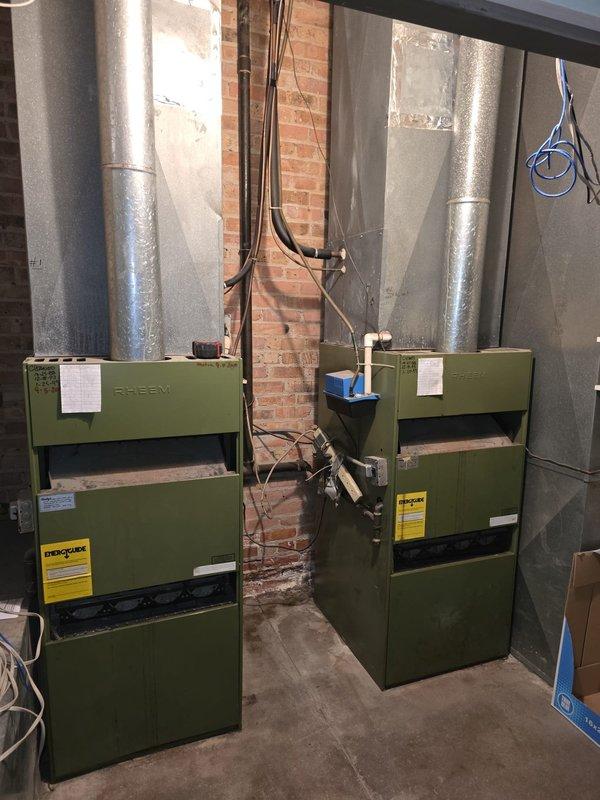 Conducted comprehensive site assessment for complete HVAC system replacement in 7,800 square foot commercial space. Evaluated existing dual-furnace heating system configuration located in basement mechanical room, including current ductwork infrastructure and electrical connections. Documented equipment specifications and spatial requirements for proposed furnace replacement and new central air conditioning installation throughout the building. Provided detailed estimate for full system upgrade to meet commercial heating and cooling demands.