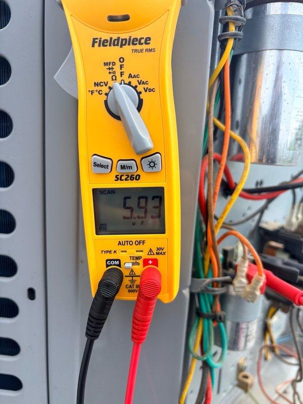 Completed spring tune-up maintenance on single HVAC system including air conditioning unit and air handler. Performed electrical diagnostics using multimeter to verify contactor operation and measured capacitor microfarad reading at 593 MFD. Customer maintains their own filters, so no filter service was performed during this visit.