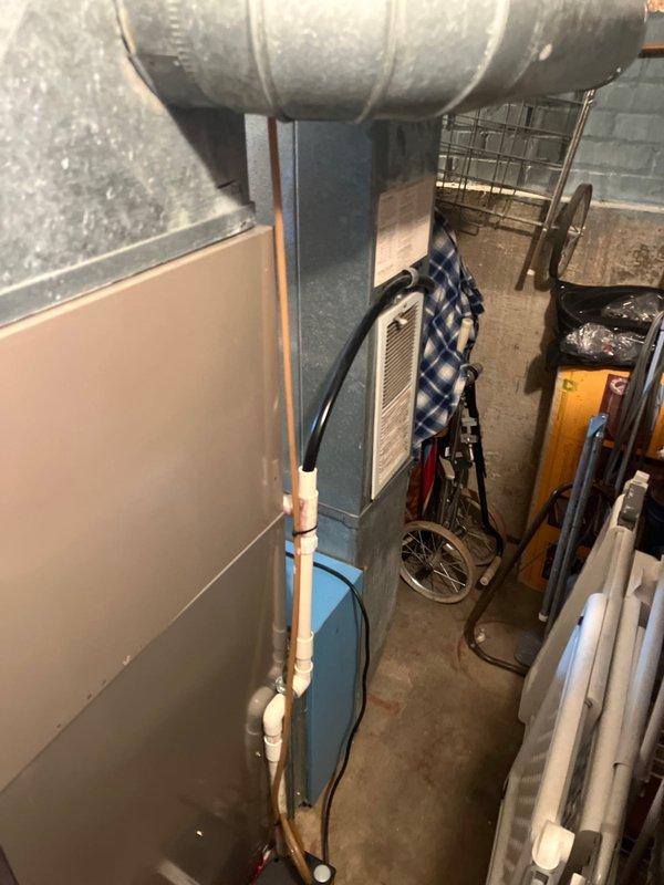 Completed full HVAC system replacement including furnace installation in basement utility area and outdoor air conditioning condenser unit mounted on concrete pad with proper electrical disconnect. Return service call addressed heating issues reported following initial installation, performed diagnostics and necessary adjustments to ensure proper system operation.