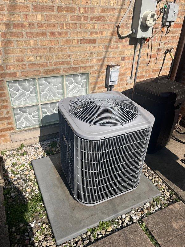Completed full HVAC system replacement including furnace installation in basement utility area and outdoor air conditioning condenser unit mounted on concrete pad with proper electrical disconnect. Return service call addressed heating issues reported following initial installation, performed diagnostics and necessary adjustments to ensure proper system operation.
