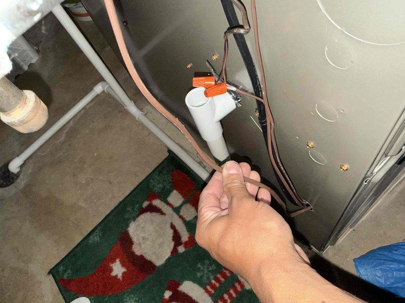 # New Thermostat Wire Installation

Installed new thermostat wire to HVAC system control board, establishing proper connections for improved system communication and control. Accessed main control board within equipment enclosure, terminated multi-conductor thermostat cable to appropriate terminals, and verified all wire connections for proper system operation.