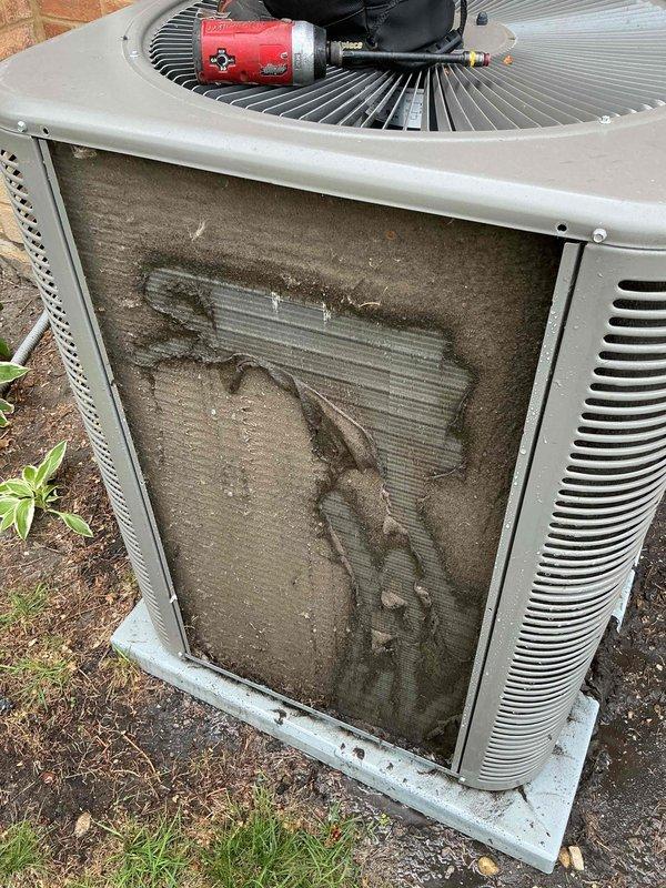Performed Comfort Plan clean and check on dual AC system per service agreement. Addressed customer concern regarding inadequate cooling from one outdoor unit; conducted comprehensive inspection of both systems including refrigerant levels, electrical connections, and airflow measurements. Exterior condenser coil exhibited heavy accumulation of dirt, dust, and debris causing restricted airflow and reduced heat transfer efficiency; performed thorough coil cleaning to restore proper operation. Inspected indoor Lennox furnace unit, verified all electrical connections, tested blower motor operation, and checked condensate drainage system for proper function. Both systems operational upon completion with improved cooling performance noted on previously underperforming unit.