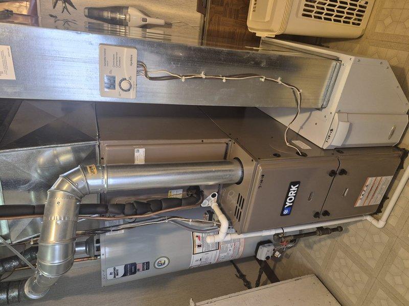 Completed Comfort Plan clean and check on York HVAC system. Discussed with customer the need to open AC unit for thorough cleaning and performed comprehensive inspection per service contract protocol. System components inspected including furnace, ductwork, air handler, and ventilation systems. Noted significant corrosion and deterioration in AC unit interior requiring attention during cleaning process.