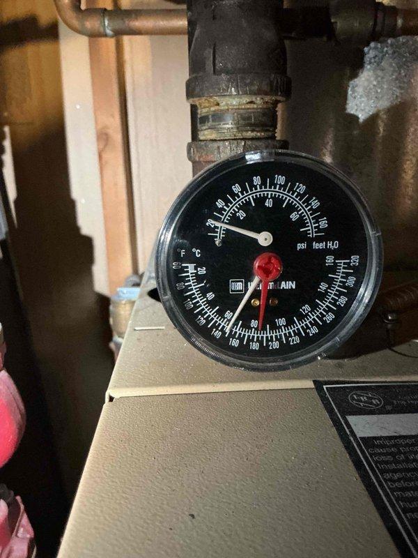 Responded to service call for hydronic heating system with non-operational radiators identified during home inspection. Performed diagnostic evaluation of boiler and circulation system, including inspection of pressure gauge readings, zone valves, and circulator pump operation. Assessed system pressure, verified proper operation of ball valves and control components, examined piping connections and flex lines for integrity, and tested heating zones to restore functionality to radiator distribution system.
