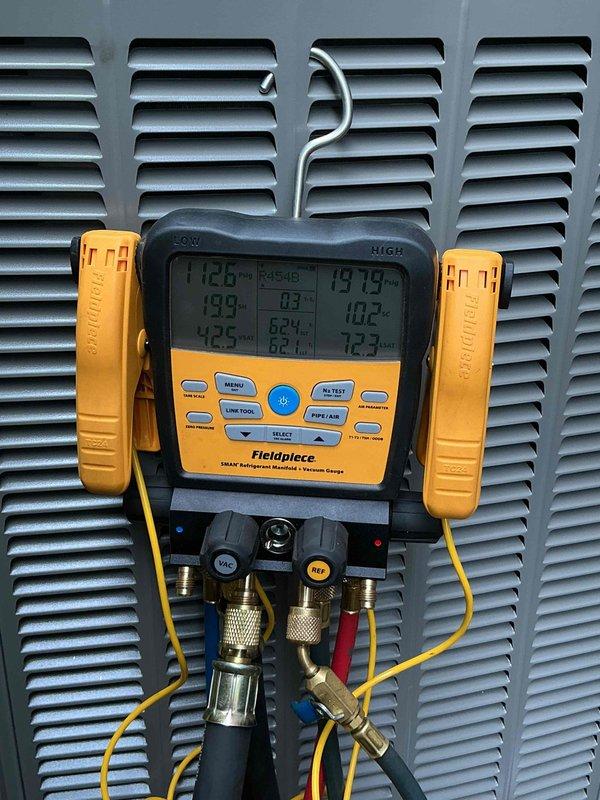 Completed full HVAC system replacement including removal and disposal of existing forced air furnace and air conditioning equipment. Installed new Lennox SLP99UH110XV60C 99% AFUE 110,000 BTU 3-stage variable speed gas furnace (Cat #19A41) with connections to existing supply/return ductwork, gas line, electrical circuit, and exhaust venting. Reclaimed refrigerant from old system and installed new Lennox EL18KCV-048-230 4-ton 18 SEER2 variable speed air conditioning condenser (Cat #25U60) on new pad with leveling, along with matching evaporator coil. Connected to existing copper refrigerant lines, evacuated system to remove moisture and air, and charged with R454B refrigerant. Verified operation of existing steam humidifier. Performed complete system startup, testing, adjustment, and safety inspection with digital manifold gauges and electrical testing equipment to confirm proper operation of all components. System operating within manufacturer specifications with 12-year parts warranty 