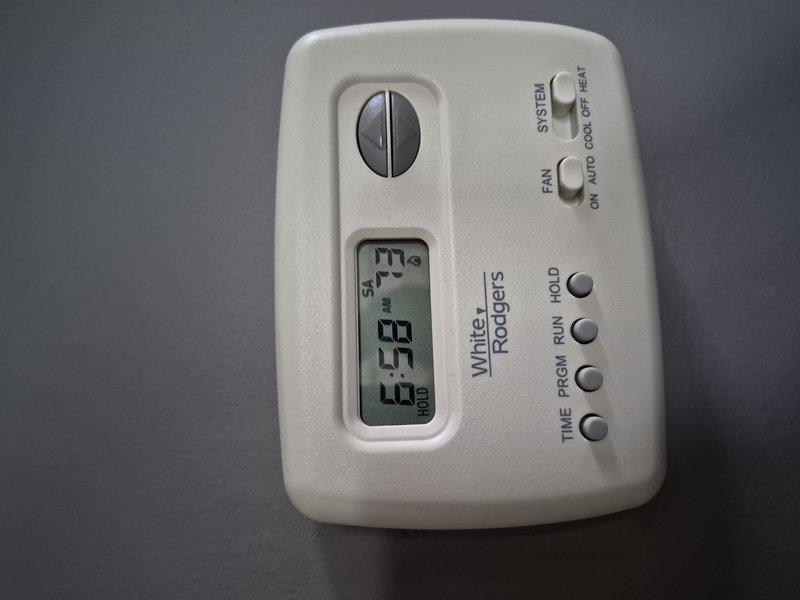 Replaced failed blower motor capacitor on first floor HVAC unit and recharged system with refrigerant to achieve proper subcooling levels. System tested and verified operational with thermostat responding correctly to temperature settings.