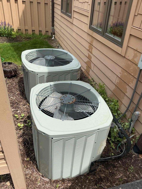 Completed comprehensive preventive maintenance on two residential air conditioning condensing units located at exterior of home. Performed standard tune-up procedures on both systems including inspection of condenser coils, fan motor operation, refrigerant levels, electrical connections, and contactor assemblies. Verified proper airflow through both units, checked amperage draws on compressor and fan motors, and ensured all safety controls were functioning correctly. Both units operating within normal parameters with no immediate repairs required at time of service.
