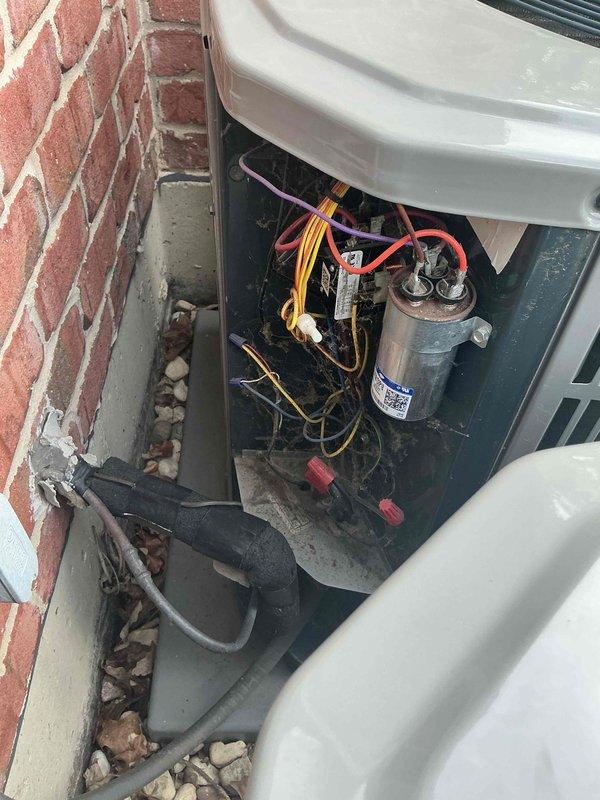 Completed comprehensive clean and check maintenance service on two air conditioning systems. Performed system diagnostics using digital testing equipment to verify proper electrical readings and operational parameters at indoor air handler unit. Inspected outdoor condensing unit, accessing electrical compartment to examine capacitor, contactor, and all wire connections for secure termination and proper condition. All components tested within normal operating specifications and systems left in proper working order.