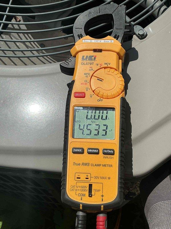 Completed comprehensive clean and check maintenance service on two air conditioning systems and two air handlers per Comfort Plan agreement. Performed electrical diagnostics using clamp meter to verify proper amperage draw and capacitance readings on both outdoor condenser units, confirming all components operating within manufacturer specifications. All systems tested and found functioning properly with no deficiencies noted at time of service.