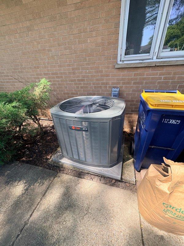 Performed scheduled Comfort Plan preventive maintenance on single-zone residential cooling system. Inspected Trane outdoor condensing unit, verified proper operation of compressor and condenser fan motor, and confirmed refrigerant levels within manufacturer specifications. Cleaned condenser coil fins and checked electrical connections at outdoor unit. Evaluated indoor air handler components, replaced disposable pleated air filter to ensure optimal airflow and system efficiency. Tested system operation and confirmed unit is cooling properly with no deficiencies noted at time of service.