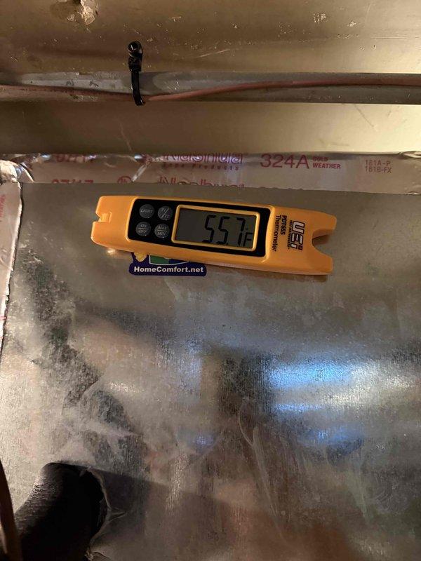 Completed spring preventative maintenance on air conditioning system per comfort plan agreement. Performed comprehensive clean and check procedures including inspection of condensate drain system, verification of proper drainage function, and measurement of supply air temperature at 55.1°F indicating adequate cooling performance. Observed condensation present on ductwork in attic space, confirming system is operating and producing cool air as designed. All components inspected and found functioning within normal operating parameters.