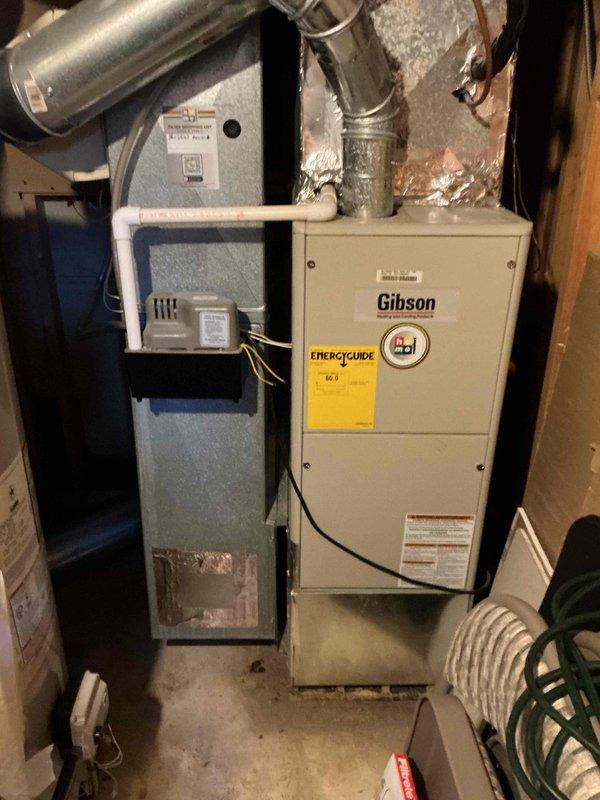 Completed comprehensive clean and check maintenance service on residential single-system HVAC equipment per Comfort Plan agreement. Performed thorough inspection and maintenance on Gibson furnace located in basement mechanical room and outdoor air conditioning condenser unit. All system components evaluated, cleaned, and verified to be operating within manufacturer specifications with no issues found requiring immediate attention.