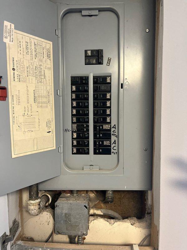 Conducted on-site evaluation for heat pump replacement in residential property currently utilizing radiant heating system. Assessed existing electrical infrastructure including main breaker panel and available circuit capacity to determine compatibility with new heat pump installation requirements. Documented current mechanical and electrical systems to develop comprehensive equipment specifications and installation plan for transitioning from radiant heat to heat pump system.