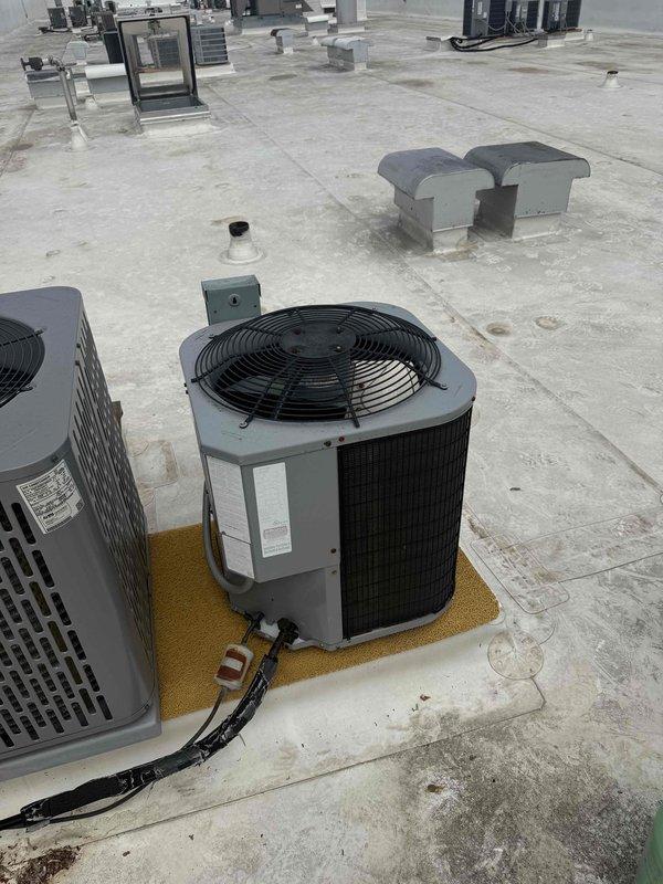 Responded to service call for commercial rooftop HVAC system requiring refrigerant recharge. Upon arrival, assessed multiple rooftop condensing units and identified the system with low refrigerant charge. Utilized 9010A electronic charging scale to accurately measure and add refrigerant to manufacturer specifications, restoring proper system operation. Verified refrigerant levels, checked system pressures, and confirmed unit returned to normal cooling capacity. All work completed in accordance with EPA regulations and industry standards.