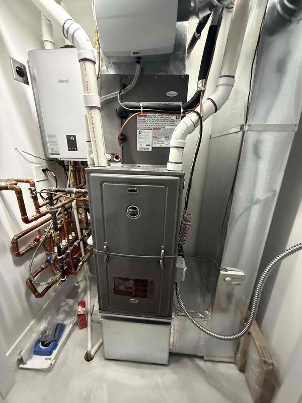 Completed comprehensive tune-up and maintenance on single-zone residential HVAC system including furnace and air conditioning unit. Inspected and tested electrical components including capacitor and contactor, verified all wire connections secure, checked system operation, and documented equipment condition with photos. Customer expressed interest in humidity control solutions for future consideration.