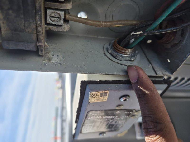 Responded to service call for non-operational air conditioning unit following roof work where system had been disconnected and reconnected. Upon arrival, performed diagnostic inspection of outdoor condenser unit and electrical connections. Inspected condenser coil fins for damage and verified proper physical condition of heat exchanger components. Examined electrical panel, wiring connections, and component mounting to ensure proper reassembly after roof contractor disconnect. Verified all wire terminations, checked capacitor and electrical components for secure connections, and confirmed refrigerant lines were properly reconnected. System restored to operational status after inspection and reconnection verification.