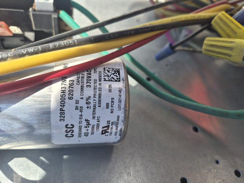 Completed scheduled Comfort Plan clean and check maintenance on air conditioning system as part of annual two-visit service agreement. Performed comprehensive inspection of outdoor condensing unit, checking electrical connections, capacitor operation, and refrigerant levels. Verified system temperatures using infrared thermometer, recording supply air temperature of 72.0°F. Inspected all wire connections including capacitor terminals with proper color-coded wiring (yellow, black, red, green, and teal wires) and wire nuts secured appropriately. All components found operating within normal parameters with no deficiencies noted. System running efficiently and ready for cooling season. Air handler inspection scheduled for fall visit per service plan agreement.