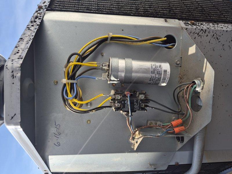 Completed comprehensive tune-up maintenance on residential air conditioning system with air handler exceeding 10 years of age. Performed thorough inspection of outdoor condensing unit electrical components including capacitor and contactor, verified all electrical connections secure, and assessed evaporator coil condition showing age-related oxidation on copper tubing. All system components tested and found operational within acceptable parameters for continued service.