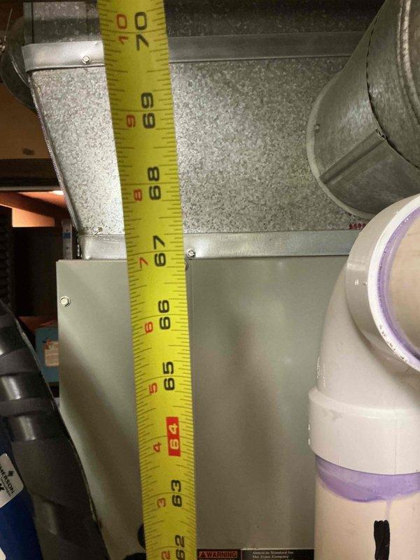 Responded to service call for 20-year-old A/C system blowing warm air with no recent maintenance history. Performed complete system diagnostic and inspection of indoor and outdoor components. Documented equipment specifications and model information for new customer account setup. Measured and inspected ductwork in attic space to assess airflow and system configuration. Evaluated refrigerant levels and system performance to determine root cause of inadequate cooling. Presented findings and recommended repair options to restore proper cooling operation.