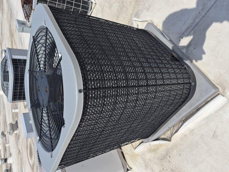 Completed annual Comfort Plan clean and check maintenance on single air conditioning system. Performed comprehensive inspection of outdoor condenser unit, verified proper operation of fan motor and compressor, cleaned protective mesh grille, and tested electrical components with multimeter confirming system running at optimal performance with normal temperature and voltage readings. Unit found in good working condition with no issues identified.