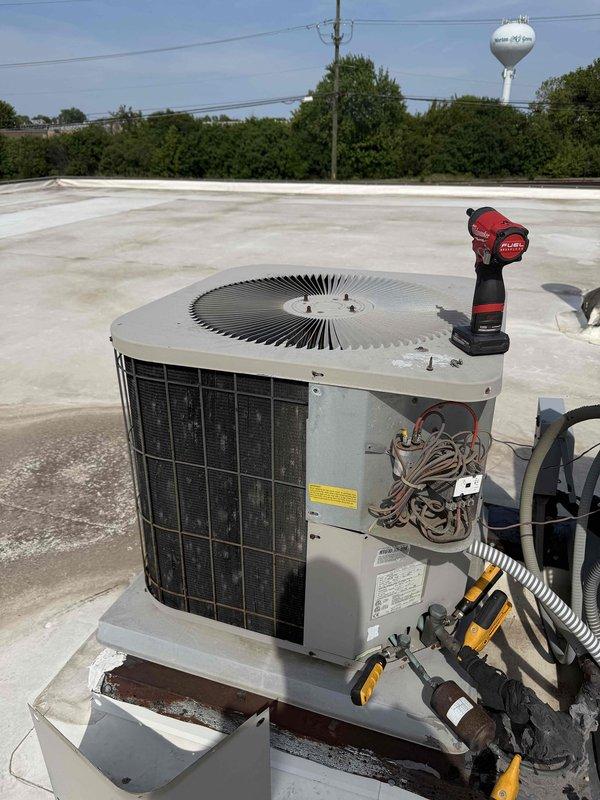 Responded to service call for non-operational rooftop AC unit at commercial facility that had been vacant during fall heating season. Upon arrival, performed comprehensive inspection of dual packaged rooftop units including visual assessment of external components, electrical connections, and mechanical systems. Accessed internal compartments to examine wiring, control boards, and safety devices. Verified unit operation and functionality to ensure proper cooling capacity for newly occupied space.